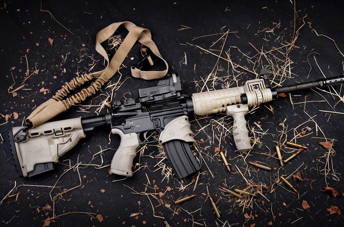 AR-15 rifle with sling and ammunition
