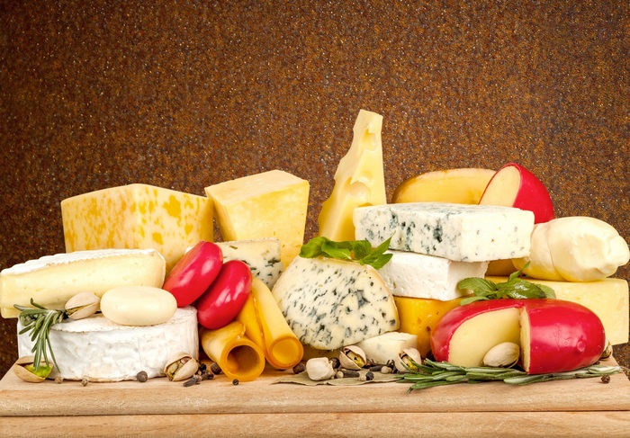 Assortment of Various Cheeses 4K Display