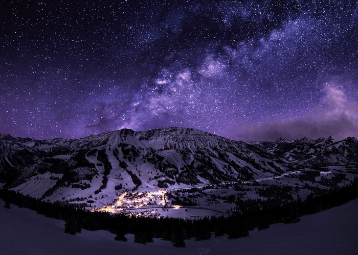 Starry Night Over Snowy Mountain Village
