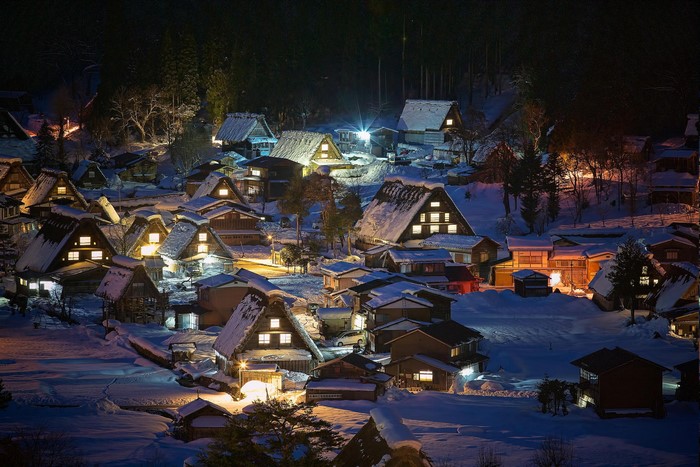 Snow-covered Japanese Village at Night in Winter