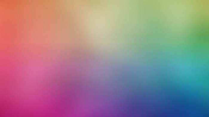 Abstract color gradient with red, pink, purple, blue, green, and yellow hues