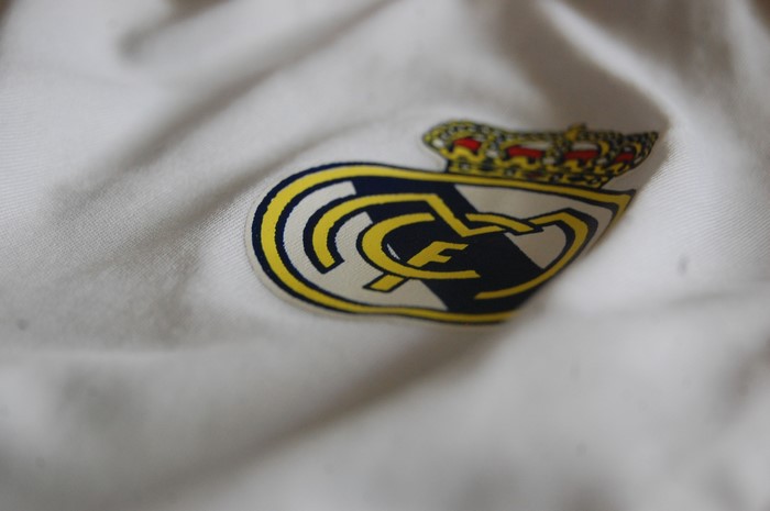 Real Madrid crest on white fabric