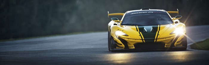 Yellow McLaren P1 GTR race car on track
