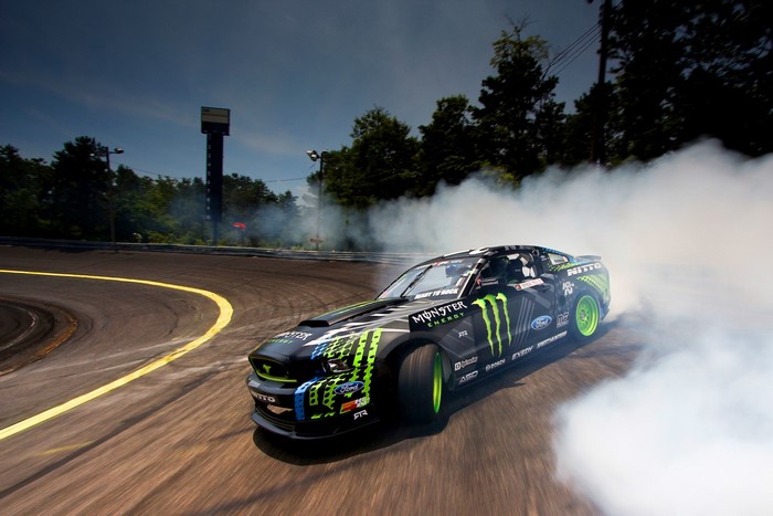 Ford Mustang drifting with Monster Energy livery