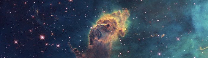 Pillars of Creation nebula in space with stars