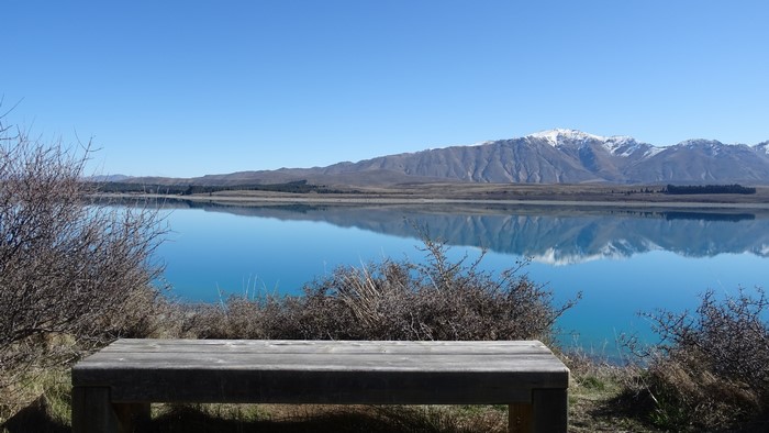 Lake Tekapo with Snowy Mountains and Bench, New Zealand