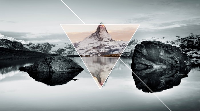 Mountain landscape with lake and geometric overlay
