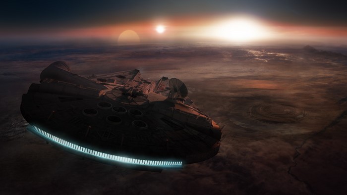 Millennium Falcon flying over a planet at sunset