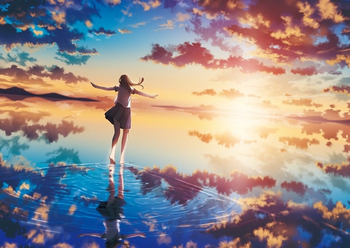 Girl in school uniform on water at sunset