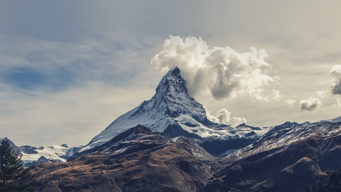 Matterhorn mountain with clouds and snowy peaks