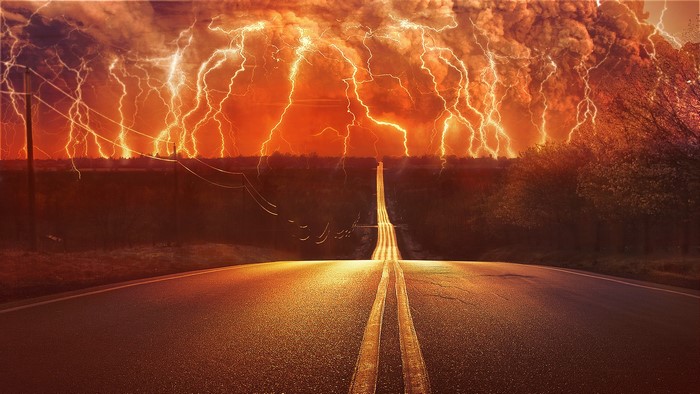 Road Leading into Fiery Lightning Storm