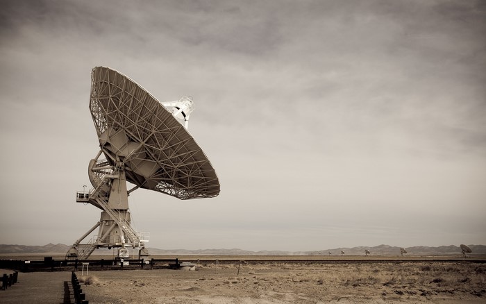 Radio telescope array in a desert landscape