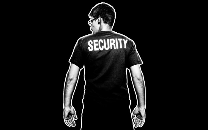 Man wearing a security t-shirt