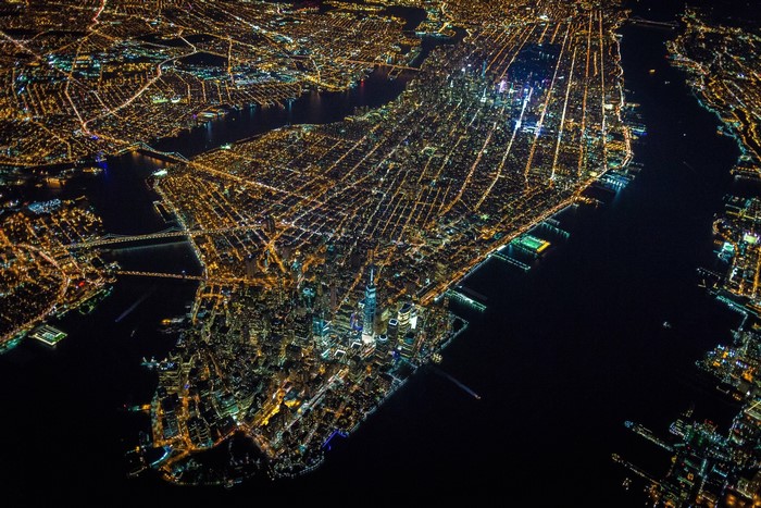 Aerial Night View of New York City Island