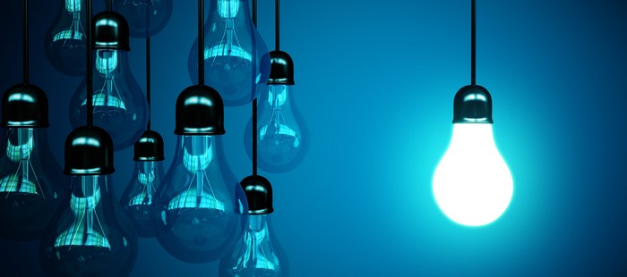 Light bulbs hanging against a blue background