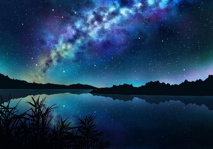 Milky Way galaxy over a calm lake at night