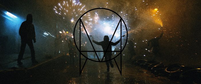 Owsla logo over people with fireworks