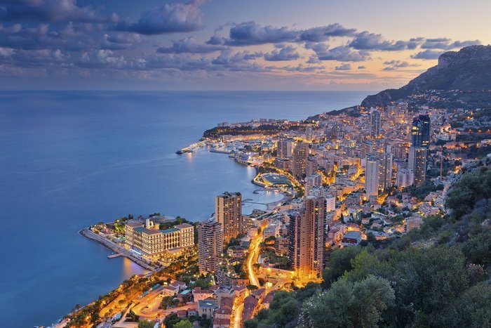 Night cityscape of Monaco along the sea