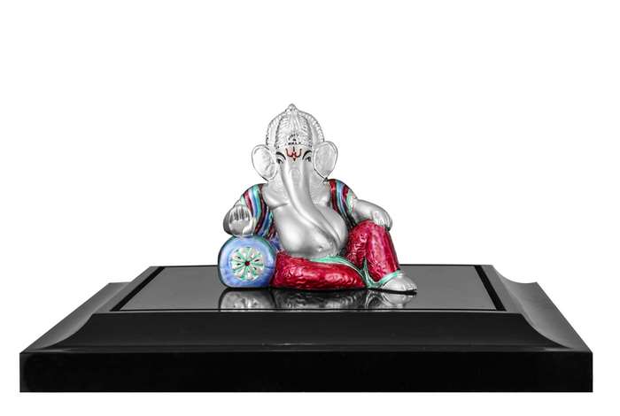 Lord Ganesha statue on a black base