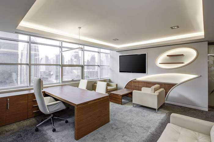 Modern office with desk and city view 4K