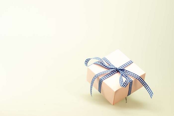 Pink gift box with blue ribbon 4K