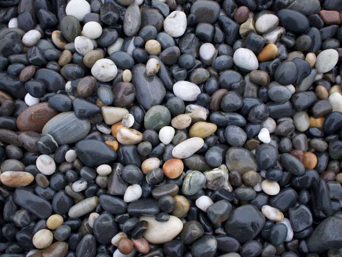 Pile of wet, smooth rocks