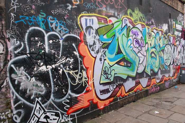 Graffiti art on a city wall in Shoreditch, London 4K