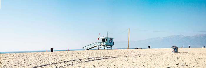 Venice Beach lifeguard stand with volleyball net