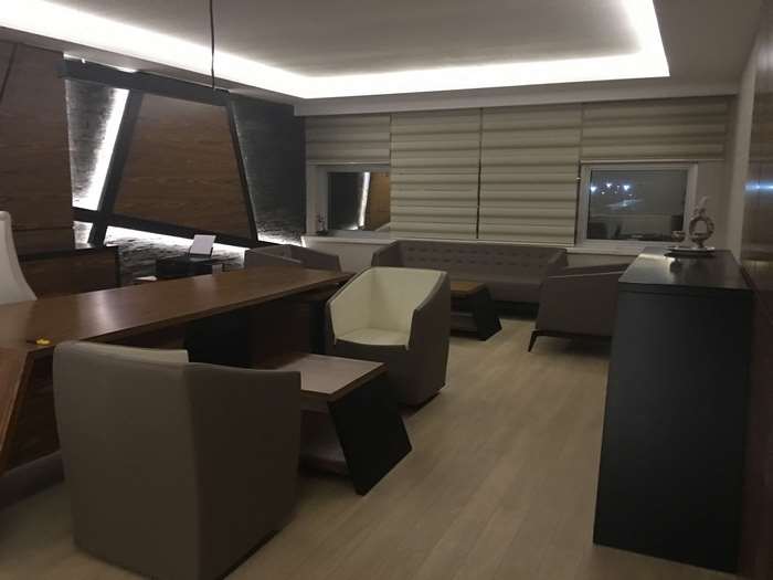 Modern Office with Desk and Seating Area