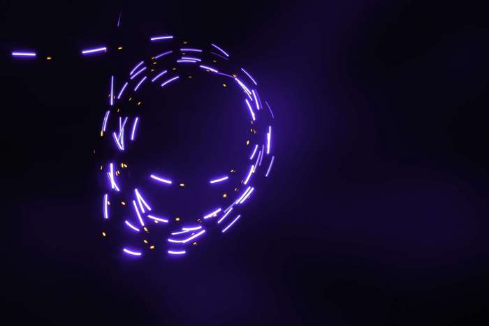 Purple and yellow light streaks in a circle