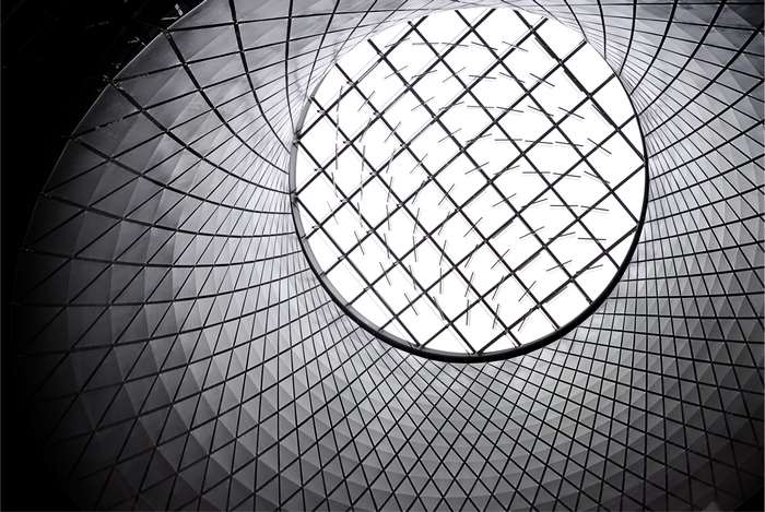 Modern Architecture with Geometric Grid Ceiling