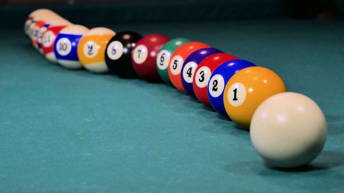 Billiard balls racked on a pool table 4K