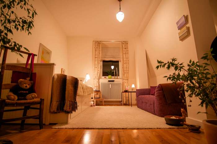 Teddy bear on a chair in a cozy room
