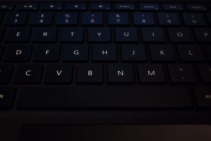 Close-up of a black illuminated keyboard