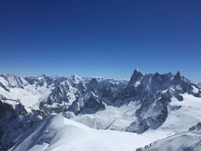 Snowy mountain range under a clear blue sky