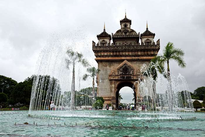 Patuxai monument in Vientiane, Laos with fountain
