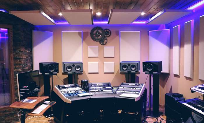 Recording studio with audio equipment and speakers
