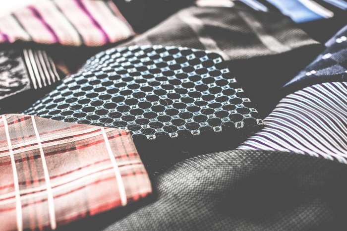 Close-up of various patterned ties