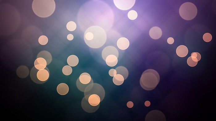 Bokeh circles on a dark gradient background