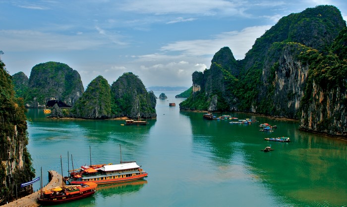 Scenic View of Limestone Islands and Boats in Vietnam