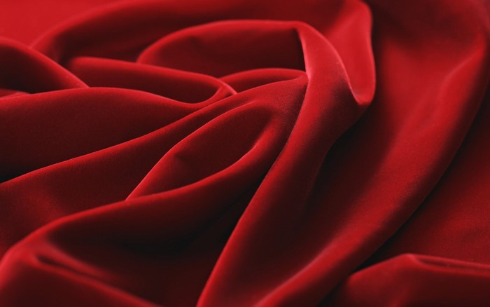 Red fabric with elegant folds