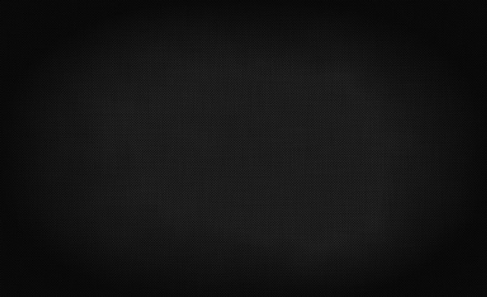 Dark textured surface with small squares