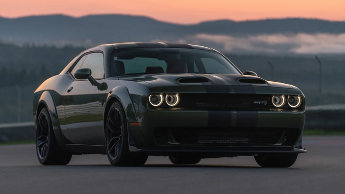 Green Dodge Challenger SRT Muscle Car at Dusk