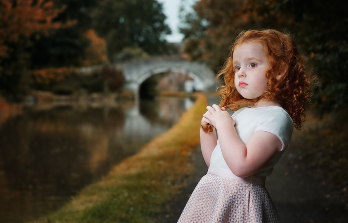 Thoughtful Redheaded Little Girl with Brown Eyes