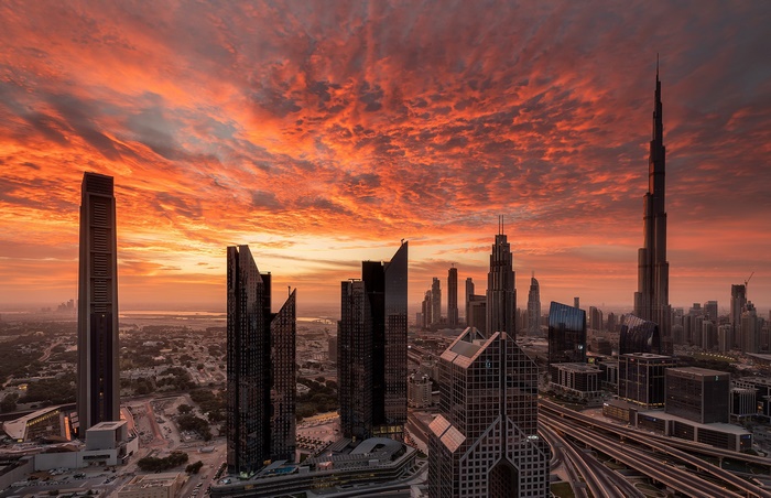 Dubai cityscape with skyscrapers at sunset