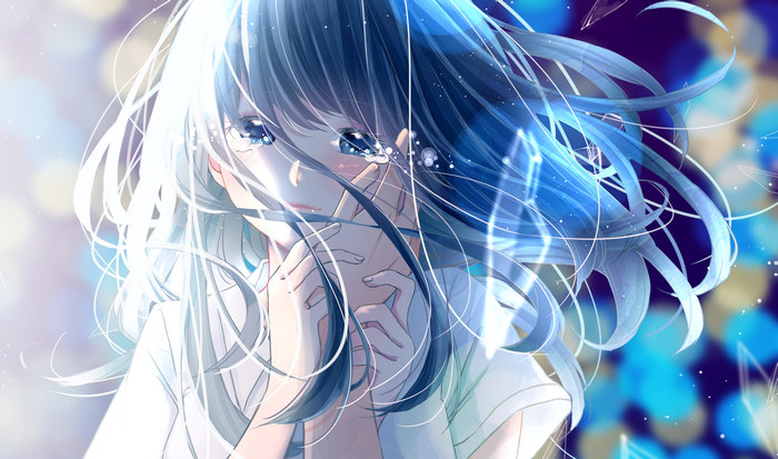 Girl with blue eyes and long hair crying