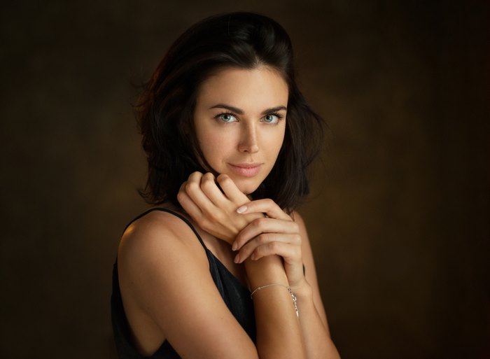 Woman with blue eyes and black hair
