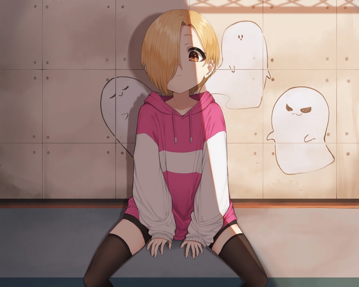 Koume Shirasaka sitting in front of wall with ghost drawings