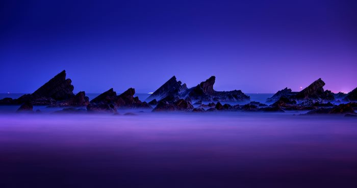 Purple Seascape with Rocks at Dusk