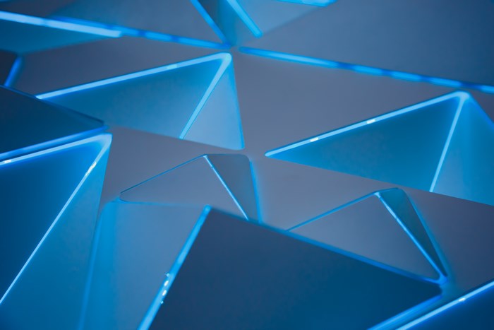 Geometric pattern with blue neon lights